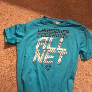 a blue under amor shirt